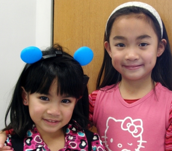 Cute sisters ears pierced at Rothsteins